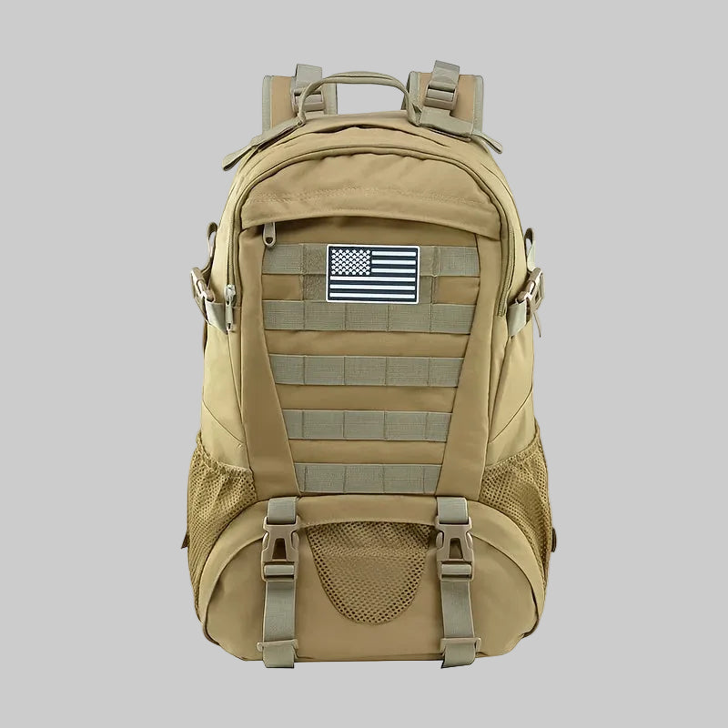 Tan backpack with American flag patch on a white background