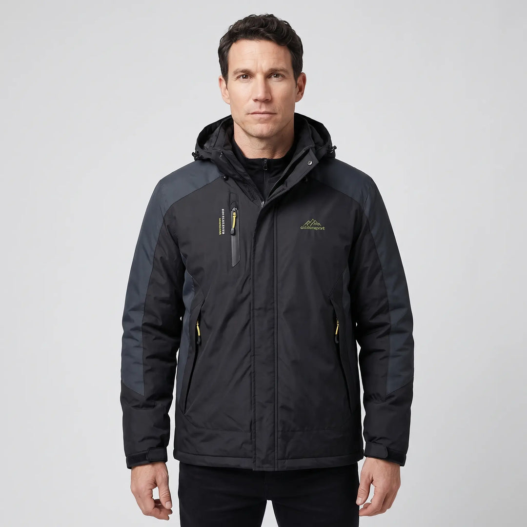 Man wearing the black insulated rain jacket in the men's cut, front view