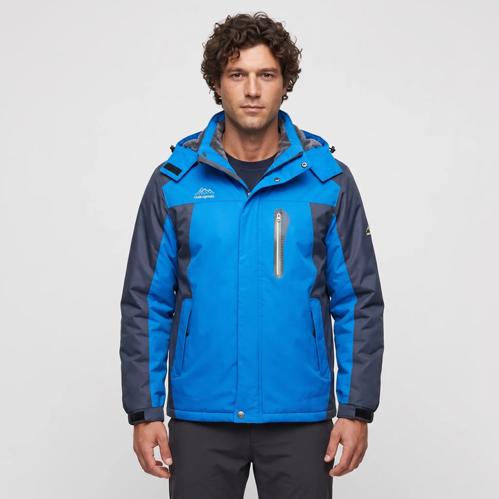 Man wearing an Ocean Blue hooded parka and ski jacket, front view