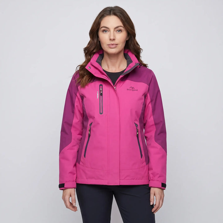 Woman wearing the pink insulated rain jacket, front view