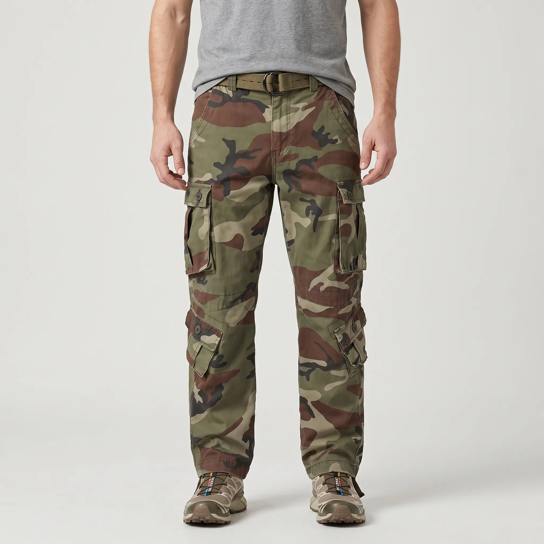 Man wearing Woodland Camo cargo pants with belt and trail shoes, front view