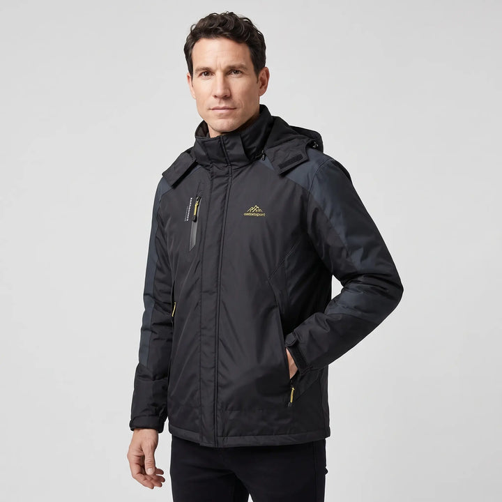 Black insulated rain jacket on a man, three-quarter view