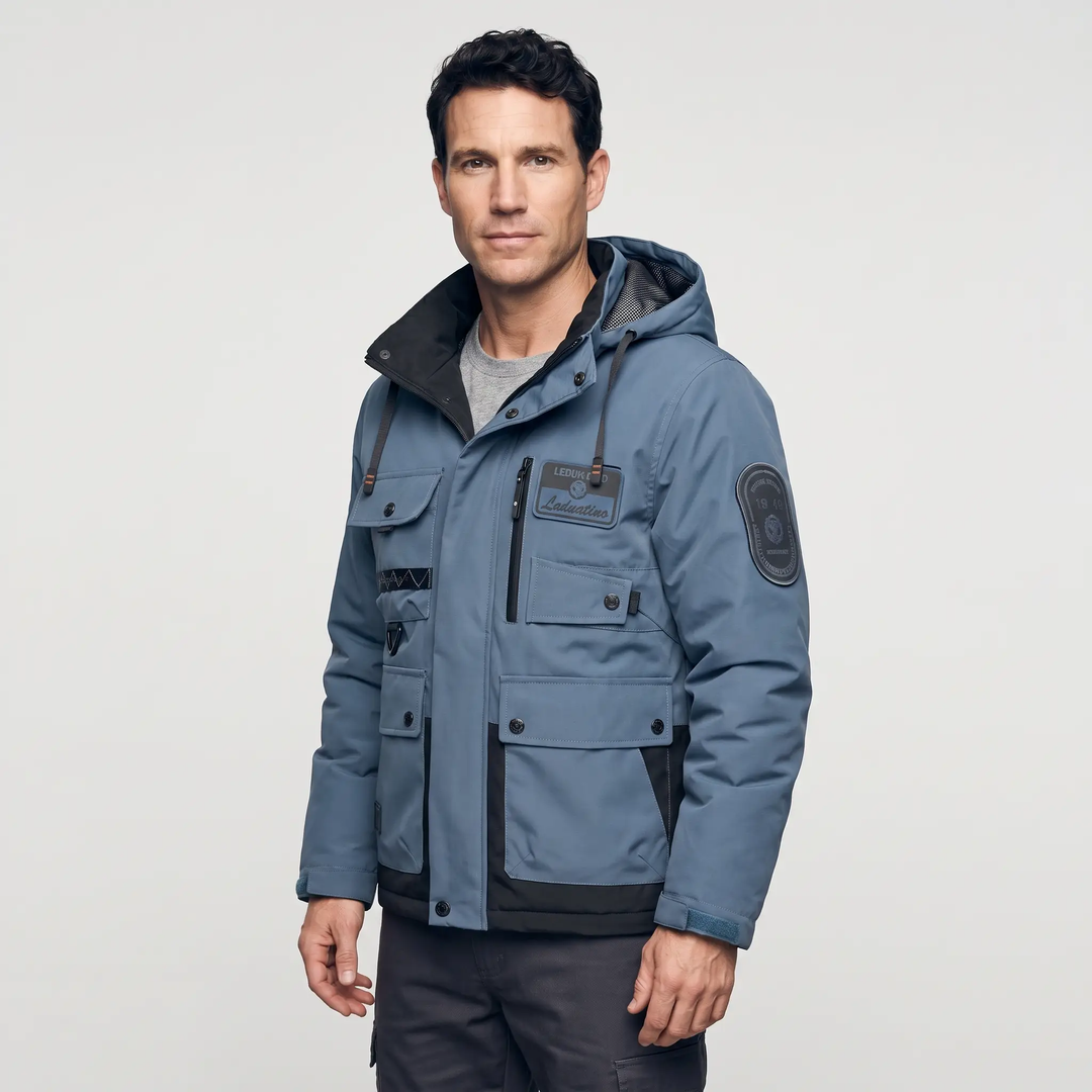 Slate Blue windbreaker jacket, three-quarter view with snap-flap pockets