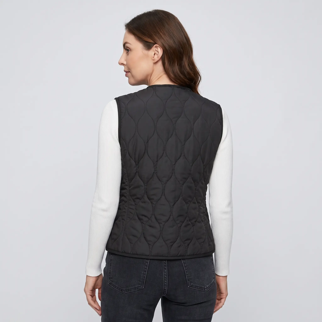 Women's puffer vest in Black, back view with onion quilting