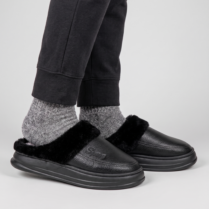 Side view of the slipper clogs worn, open back and platform sole
