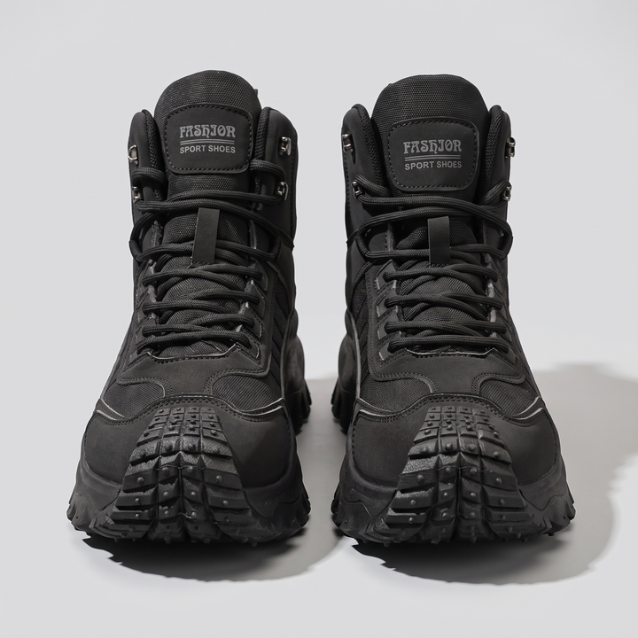 Men's hiking boots - Black - front view with tongue patch and studded toe