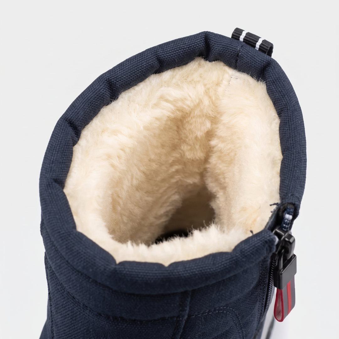 Faux-fur lining inside the open shaft of the boot