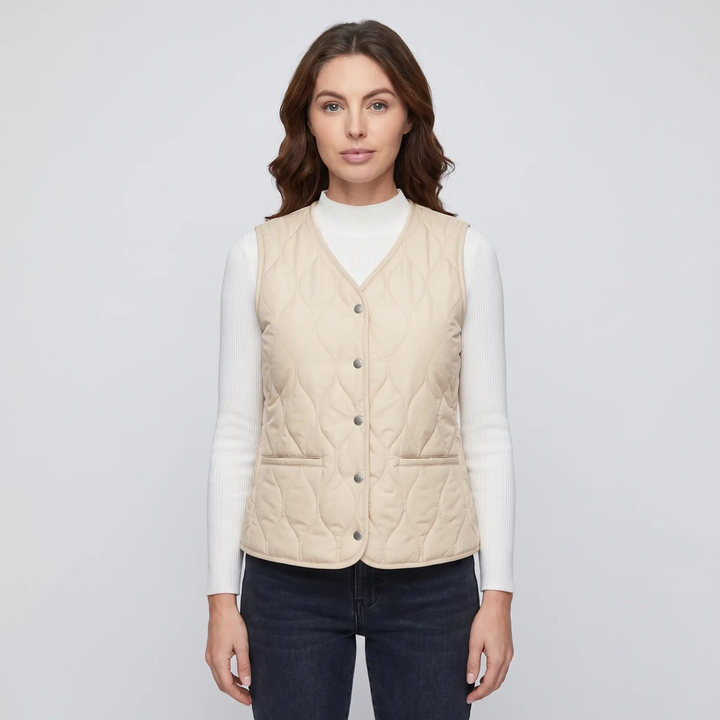 Women's quilted puffer vest in Beige, front view