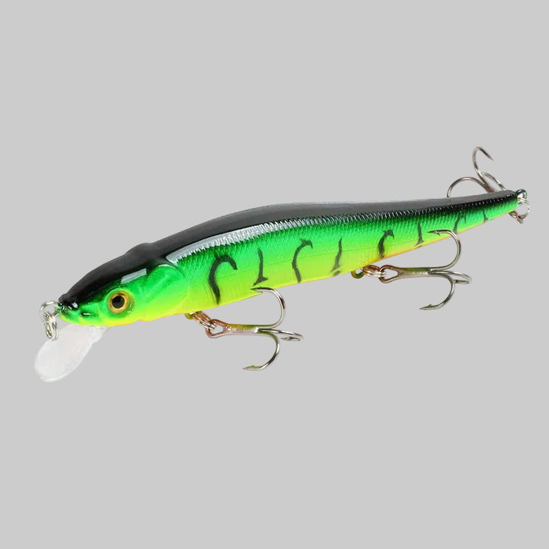 Fishing lure with green and black body on a white background