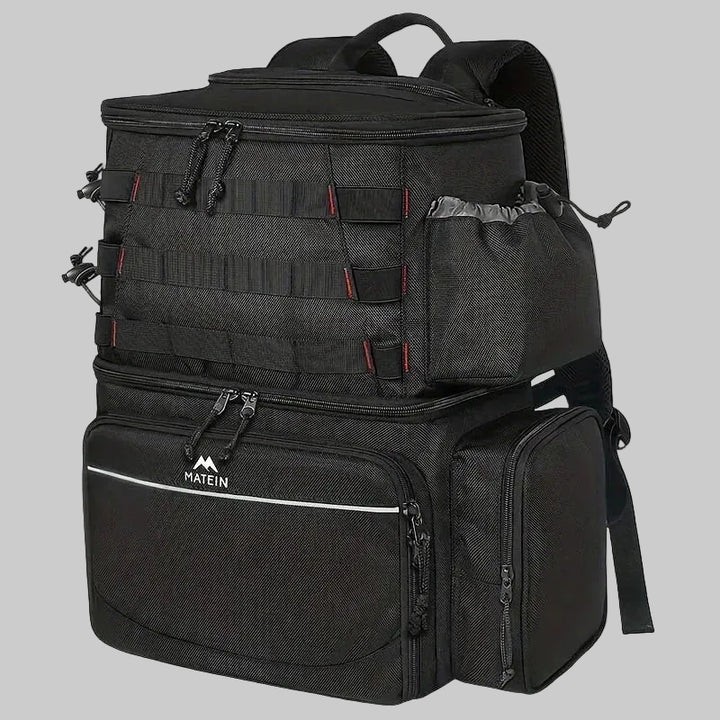 Black tactical backpack with multiple compartments on a light gray background