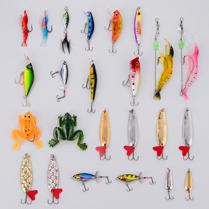 All 24 fishing lures from the advent calendar laid out: spoons, hard baits, soft frogs and shrimp
