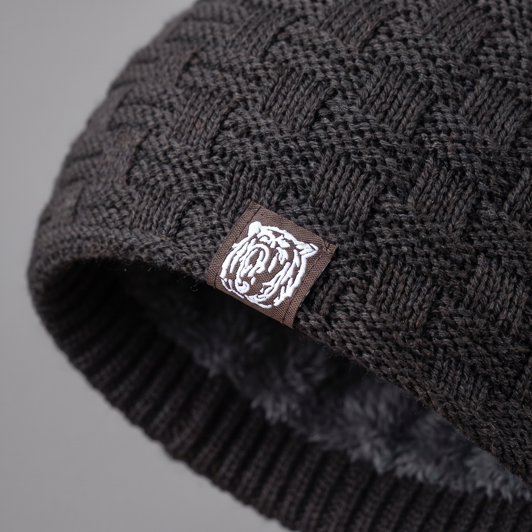 Close-up of the basketweave knit and woven tiger patch