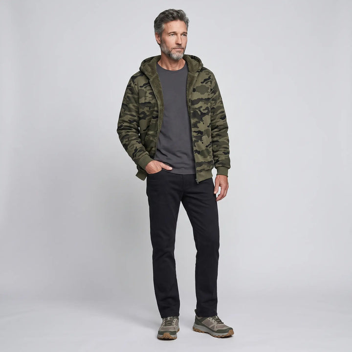 Man wearing the men's camo hoodie open over a dark tee, full body