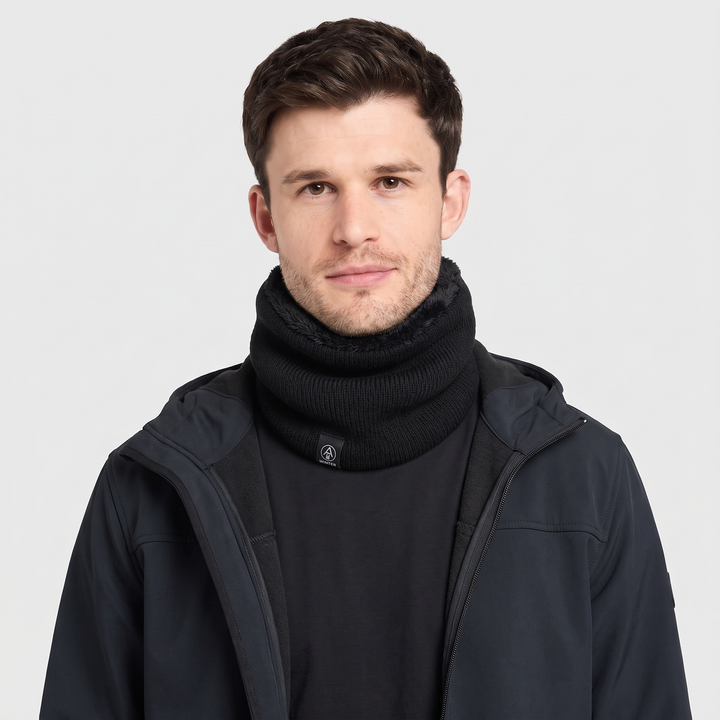 Man wearing the black knit neck gaiter under an open softshell jacket