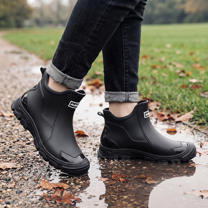 Wearing the rain boots on a wet gravel path in autumn