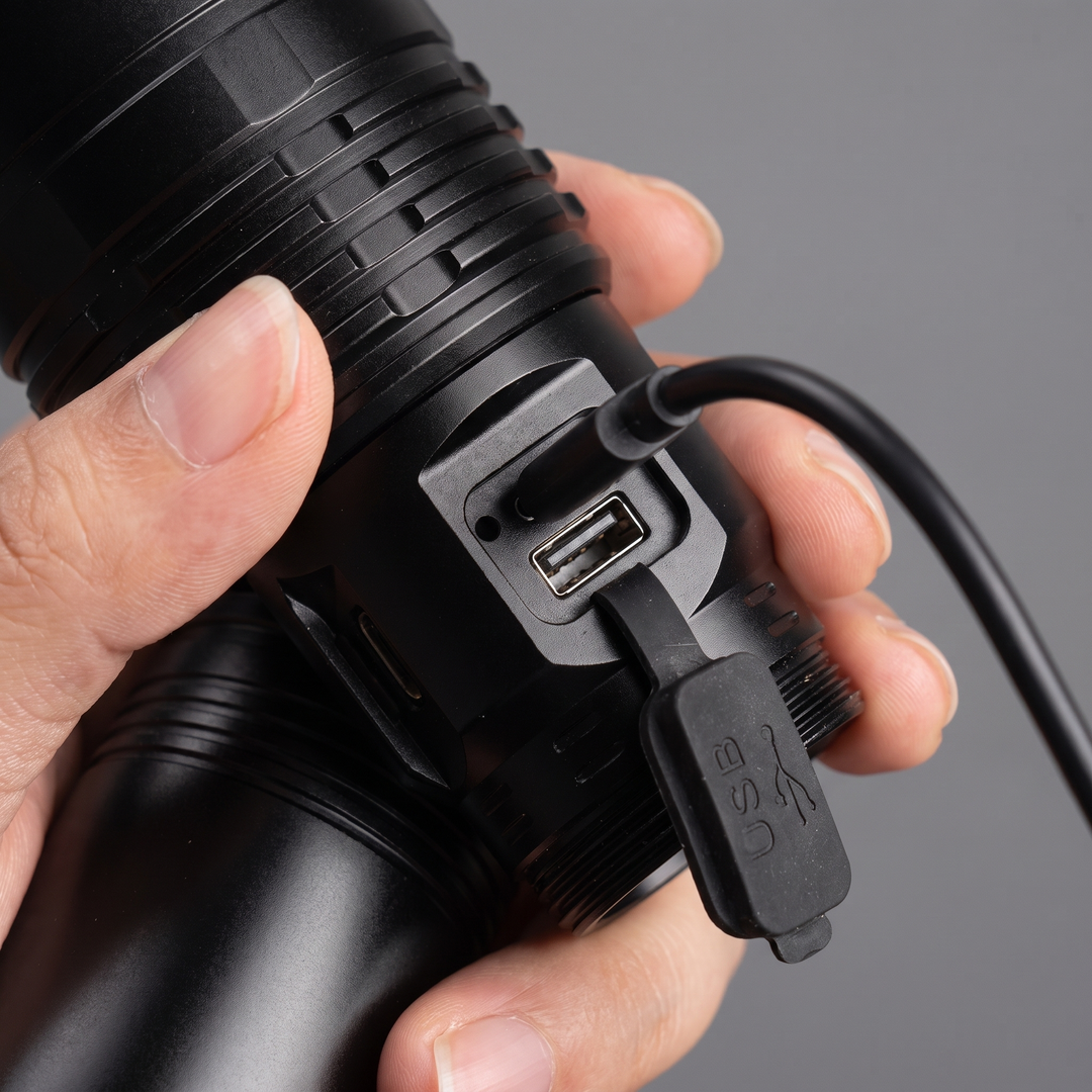 USB-C charging port and USB-A output port under the rubber flap