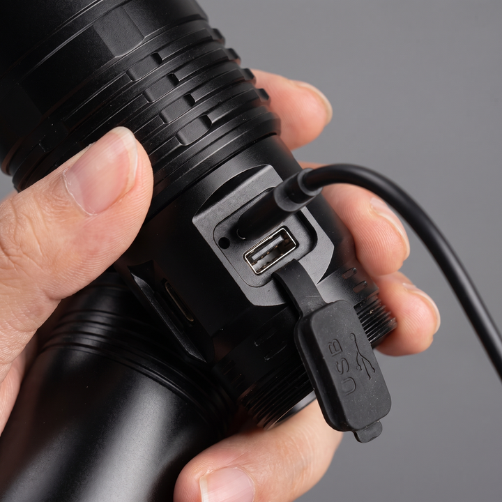 USB-C charging port and USB-A output port under the rubber flap