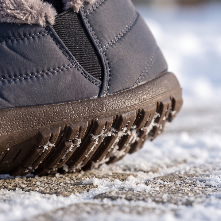 Close-up of the tread lugs against snow