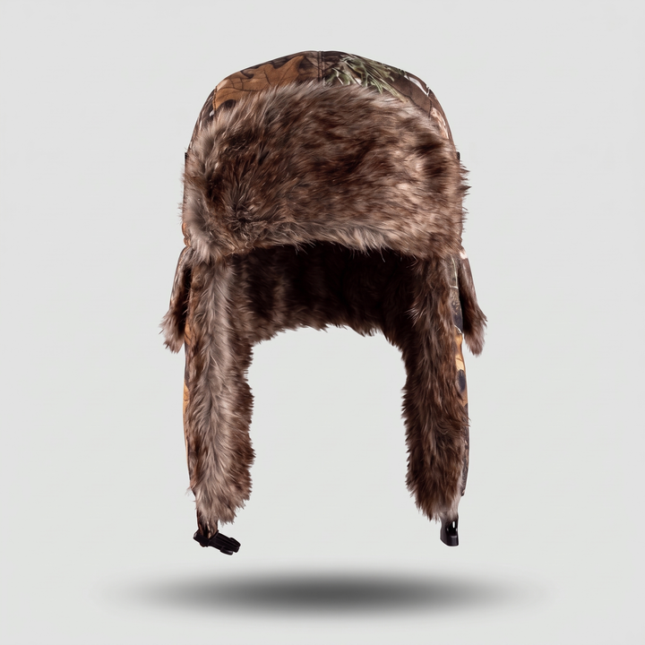 Front view of the Autumn Woodland Camo trapper hat with fur brim and ear flaps