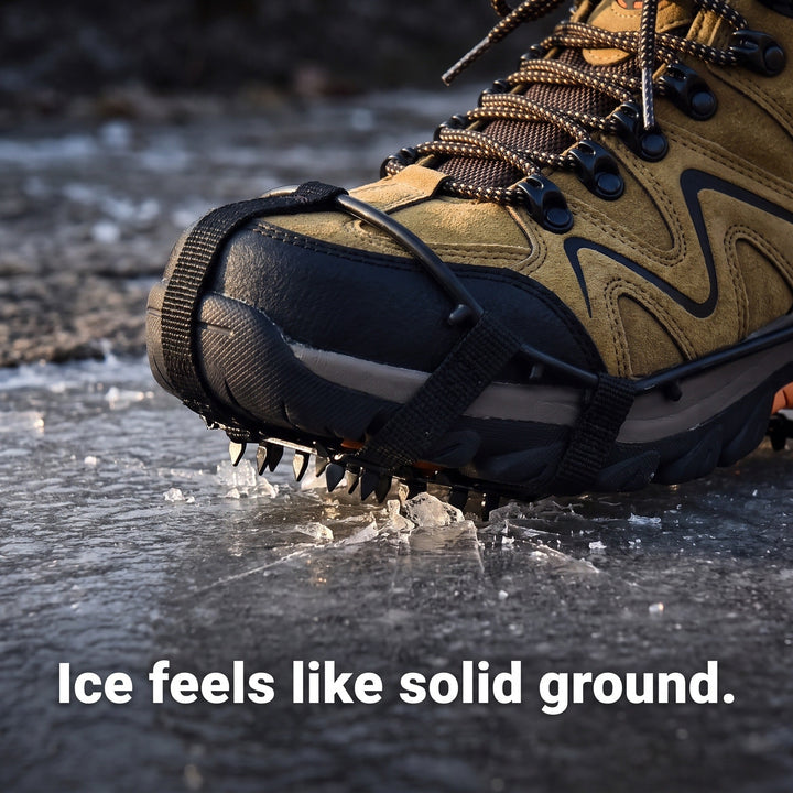 Close-up of the microspike spikes gripping sheet ice on a stone path
