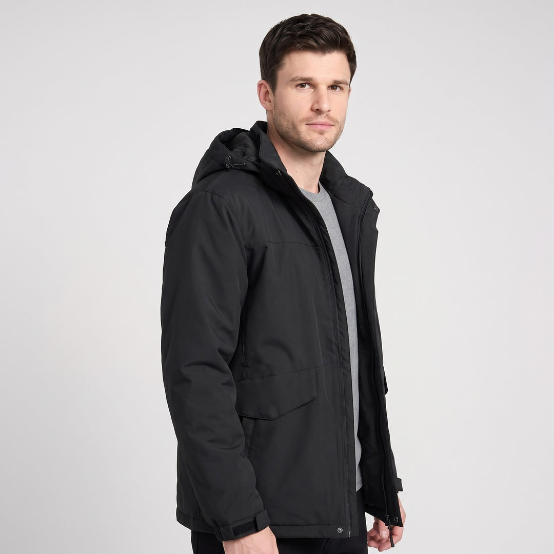 Man wearing the Men's Winter Jacket in Graphite, three-quarter side view