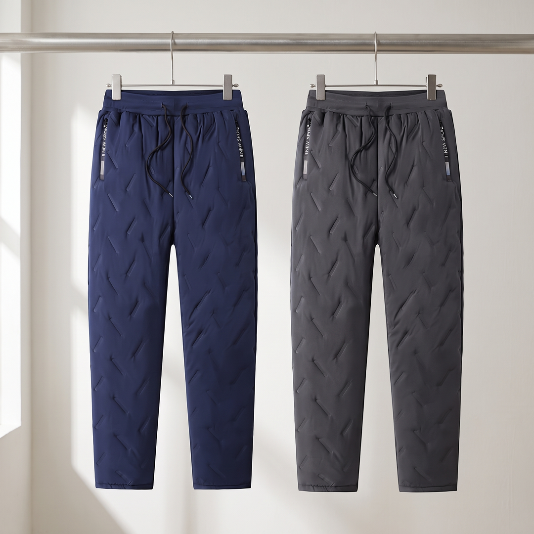 Women's fleece lined winter pants in blue and grey on hangers
