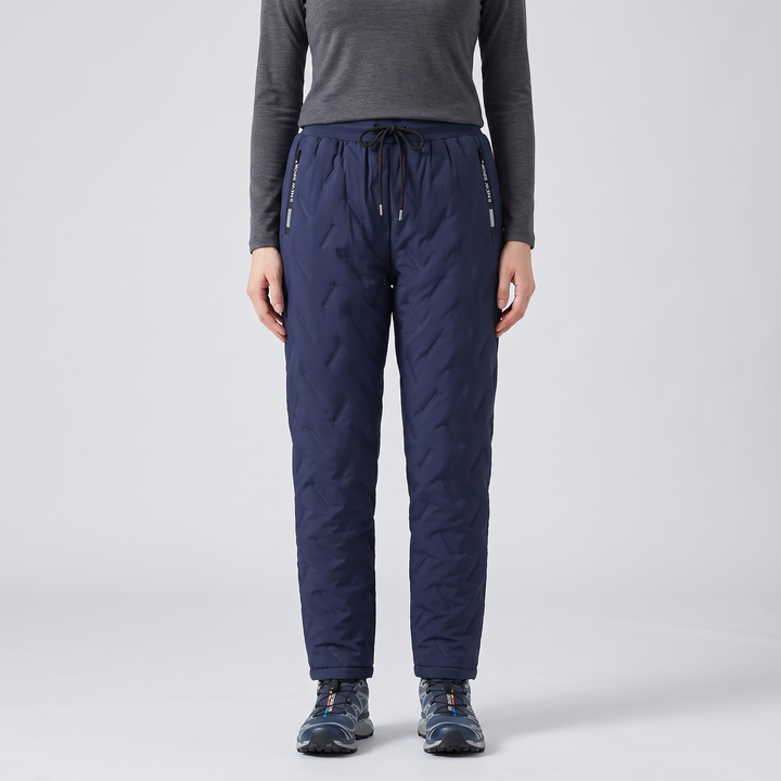 Woman wearing blue fleece lined pants, front