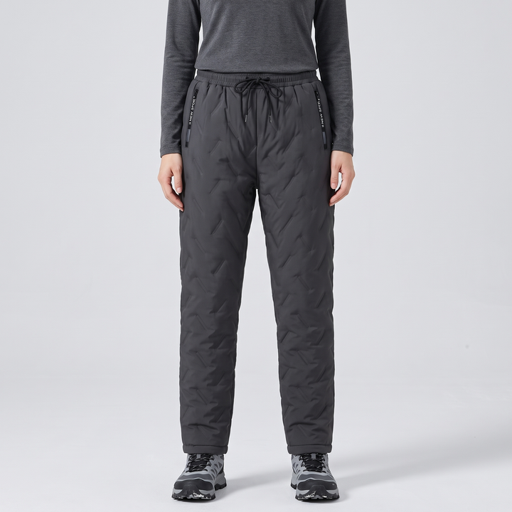 Woman wearing grey fleece lined pants, front